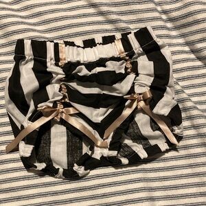 Black and White Striped Shorts with Ribbon Accents